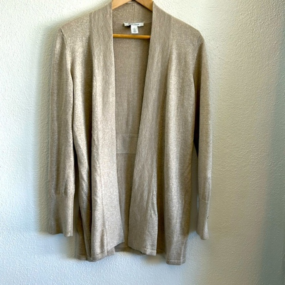 Cardigan with gold thread throughout.